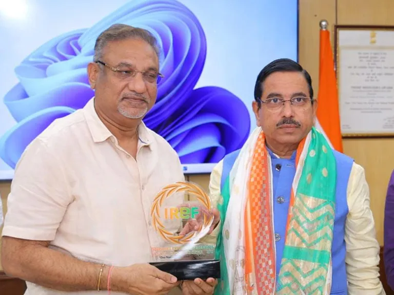 Dr Prem Garg, National President, IREF